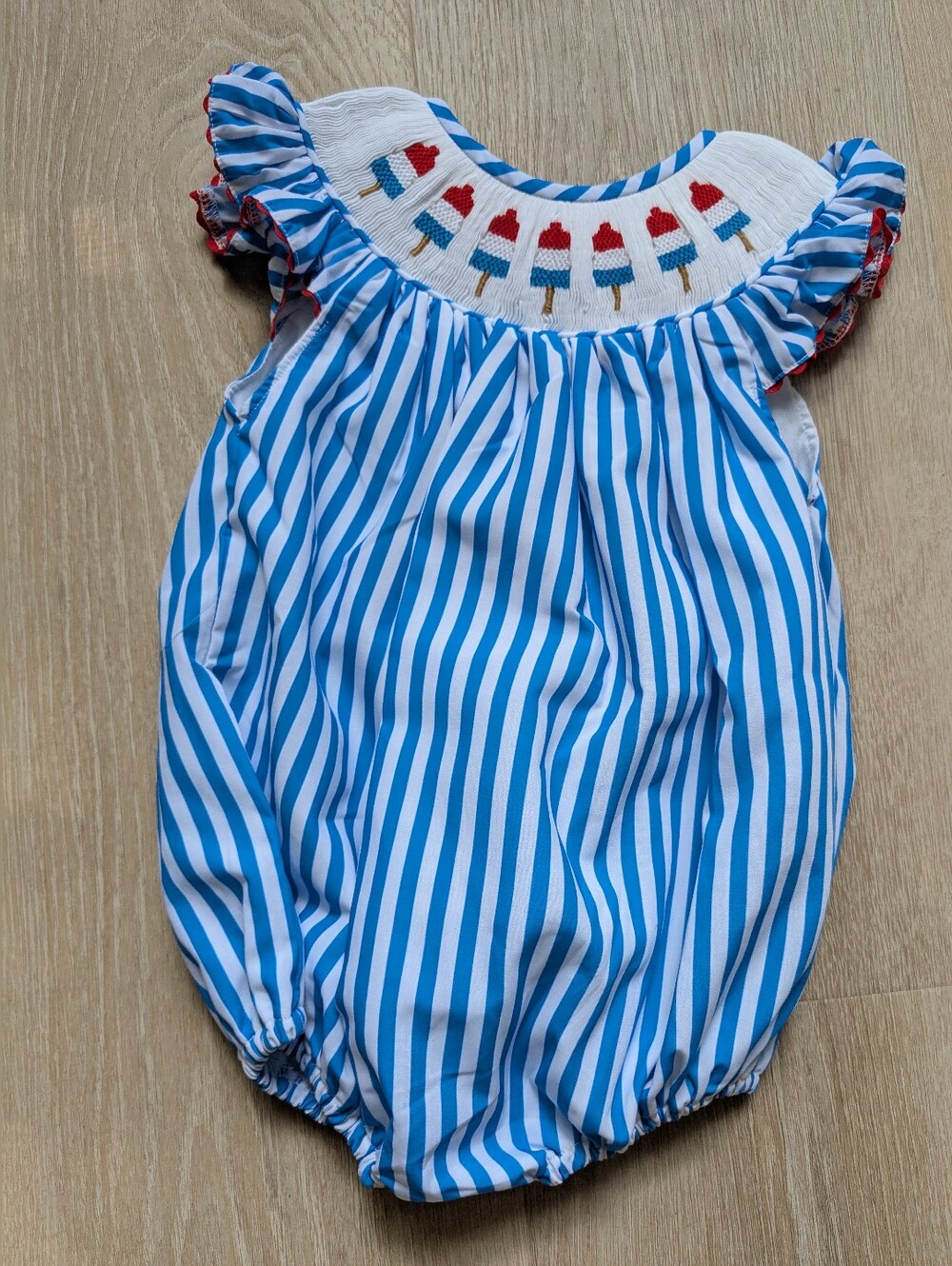 Blue & White Striped Baby Bubble Romper with Popsicle Smocking. Poppy Kids